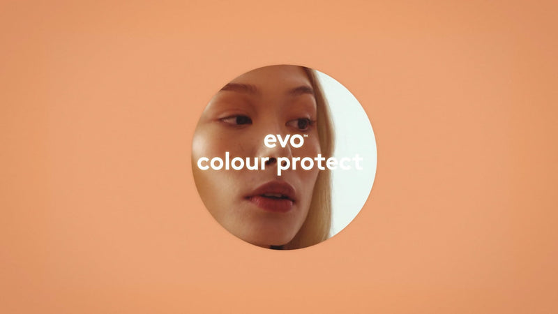 Circular inset of a person's face with 'evo colour protect' text on an orange background